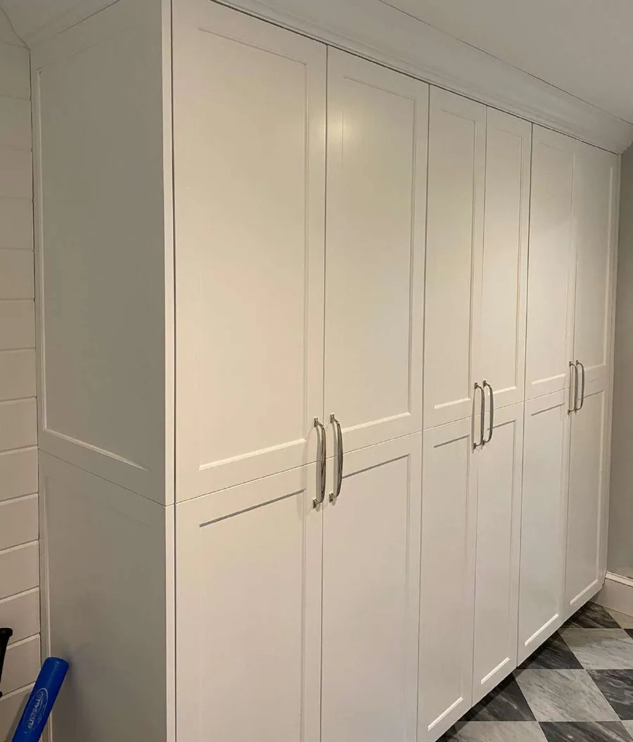Two facing runs, no corner cabinet at all. A galley buys more usable cabinet per foot than an L, because nothing is lost to a blind corner.