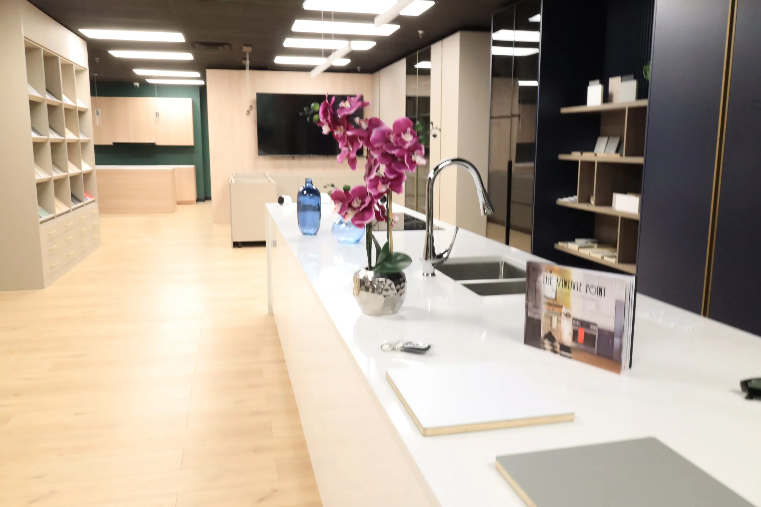 Kitchen displays and sample shelves inside the Quality Design Cabinet showroom